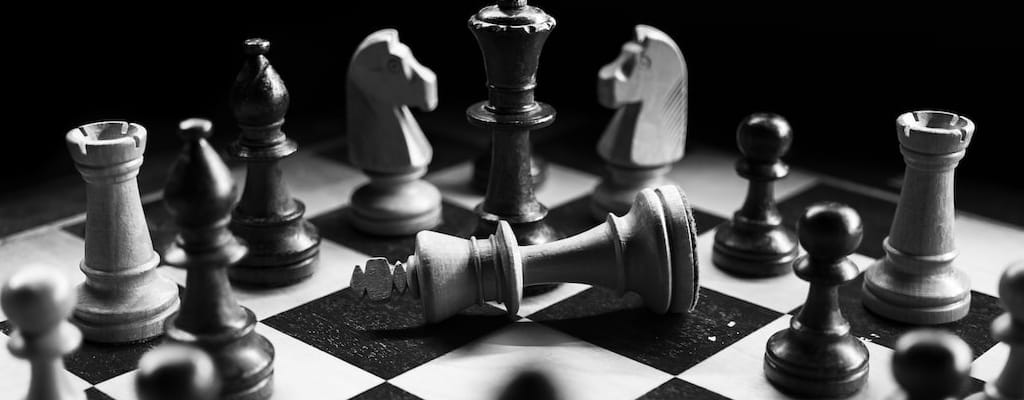 The poker game required bluffing and strategic confrontation.
