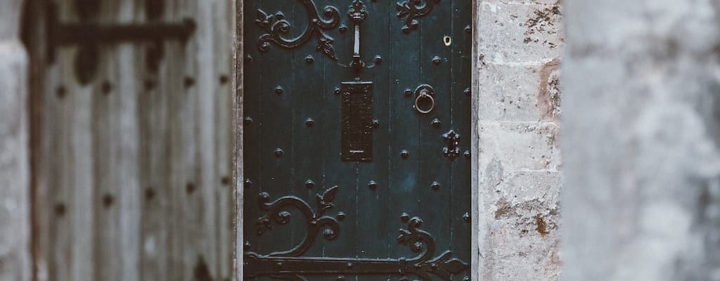 The darkened entrance invited an unwelcome metaphorical presence.