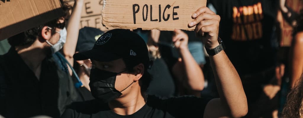 Kicking and screaming, she fought against their protests.