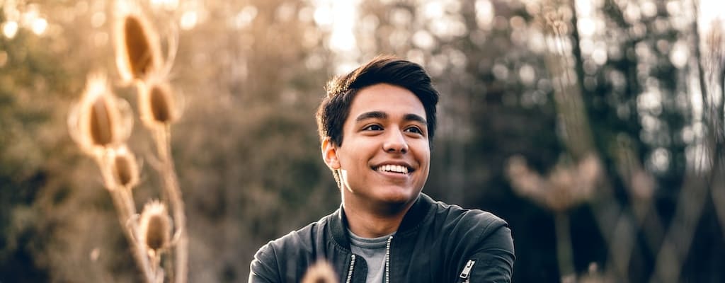 He smiled, reflecting a thousand smiles.