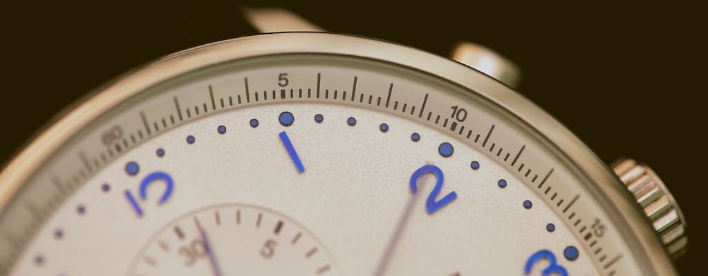 The clock ticked sporadically, occasionally, and intermittently.