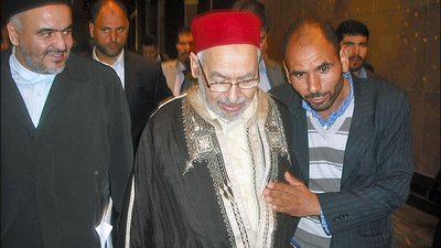 Jailed Tunisian opposition leader Ghannouchi rushed to hospital, new tariffs on Europe, and a historic visit to Eswatini.