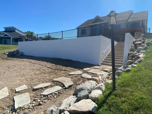 After: Lakefront Retaining Wall - White Finish