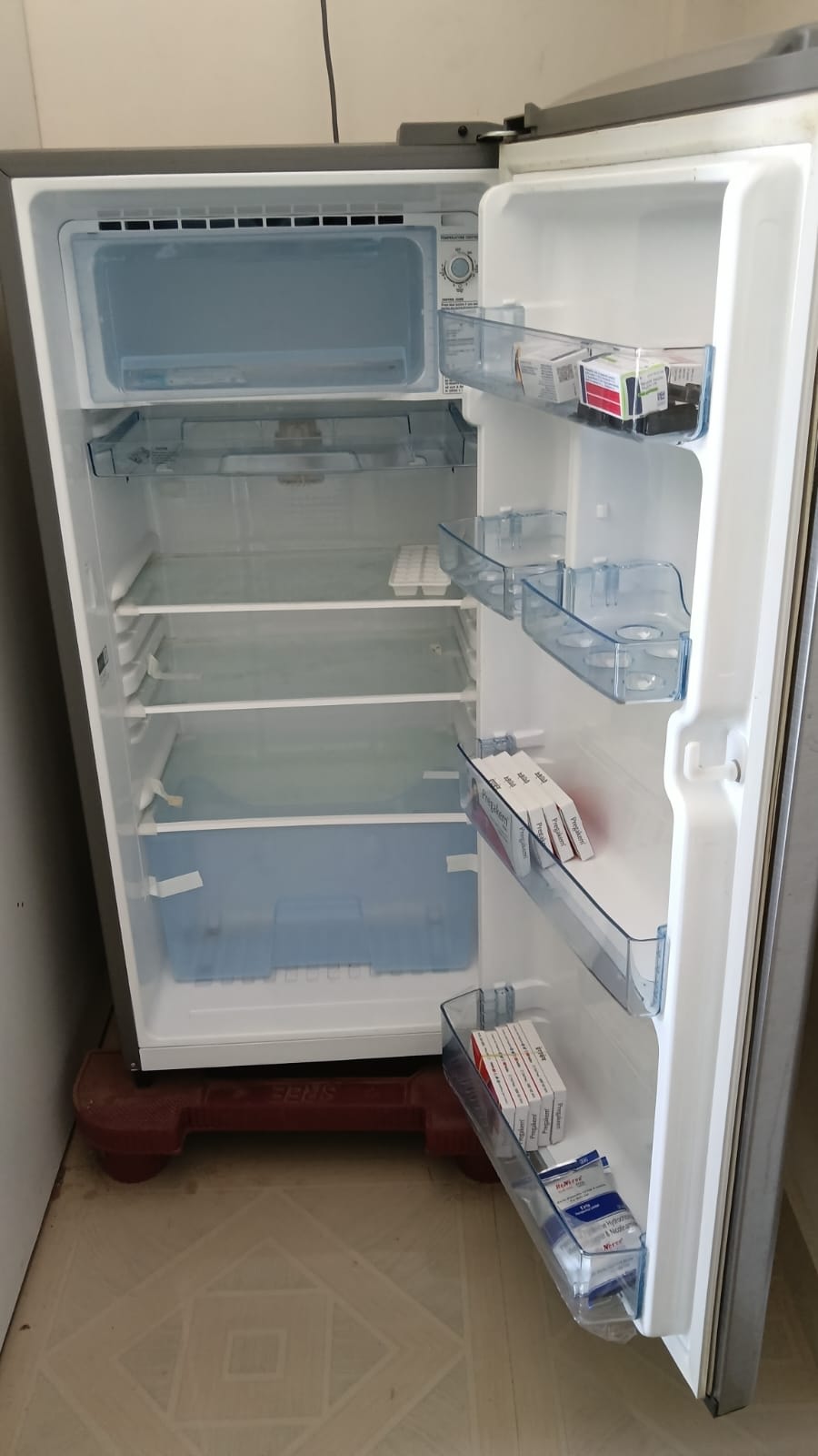 Pharmacy glass racks, fridge, AC, CCTV, computer table, counter table dot matrix printer etc - Image 1
