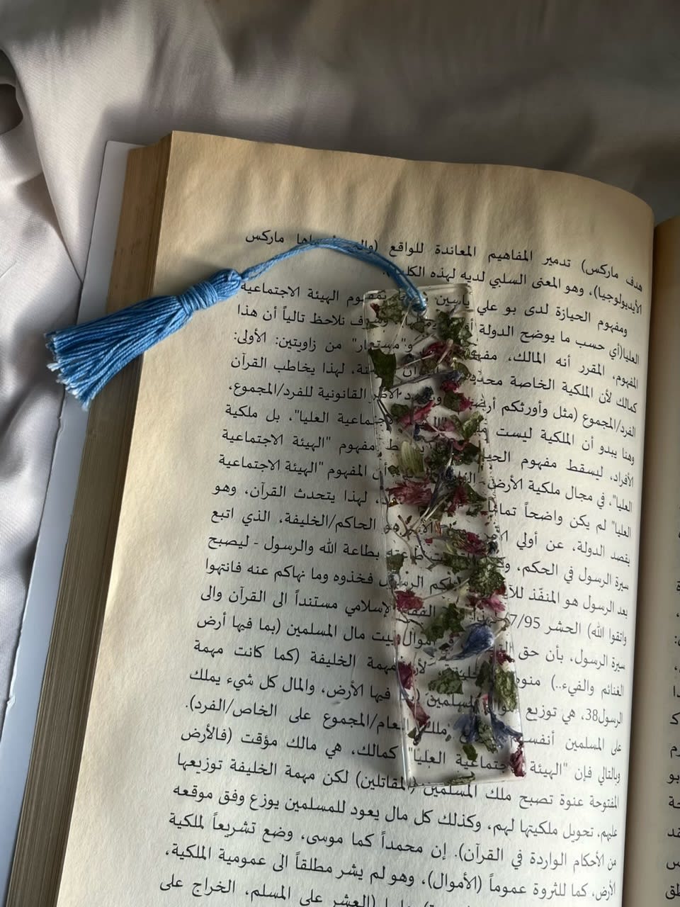 Handmade resin bookmark, made with real flowers.