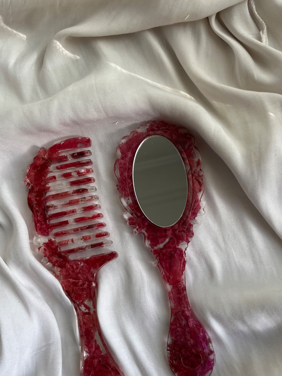 A matching mirror & comb set, made with real flowers.