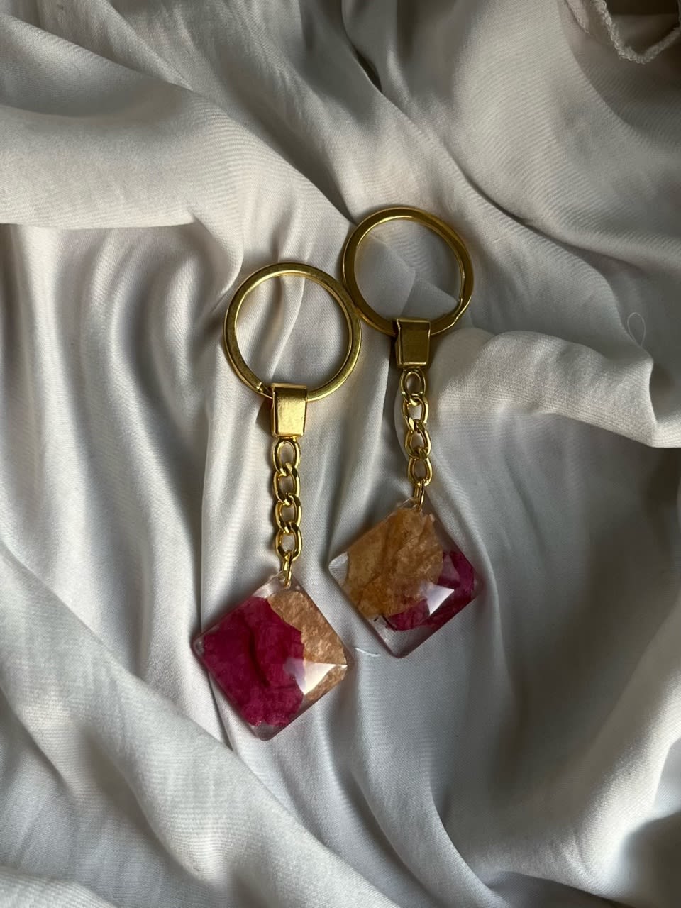Couple keychains Real flowers preserved in resin.