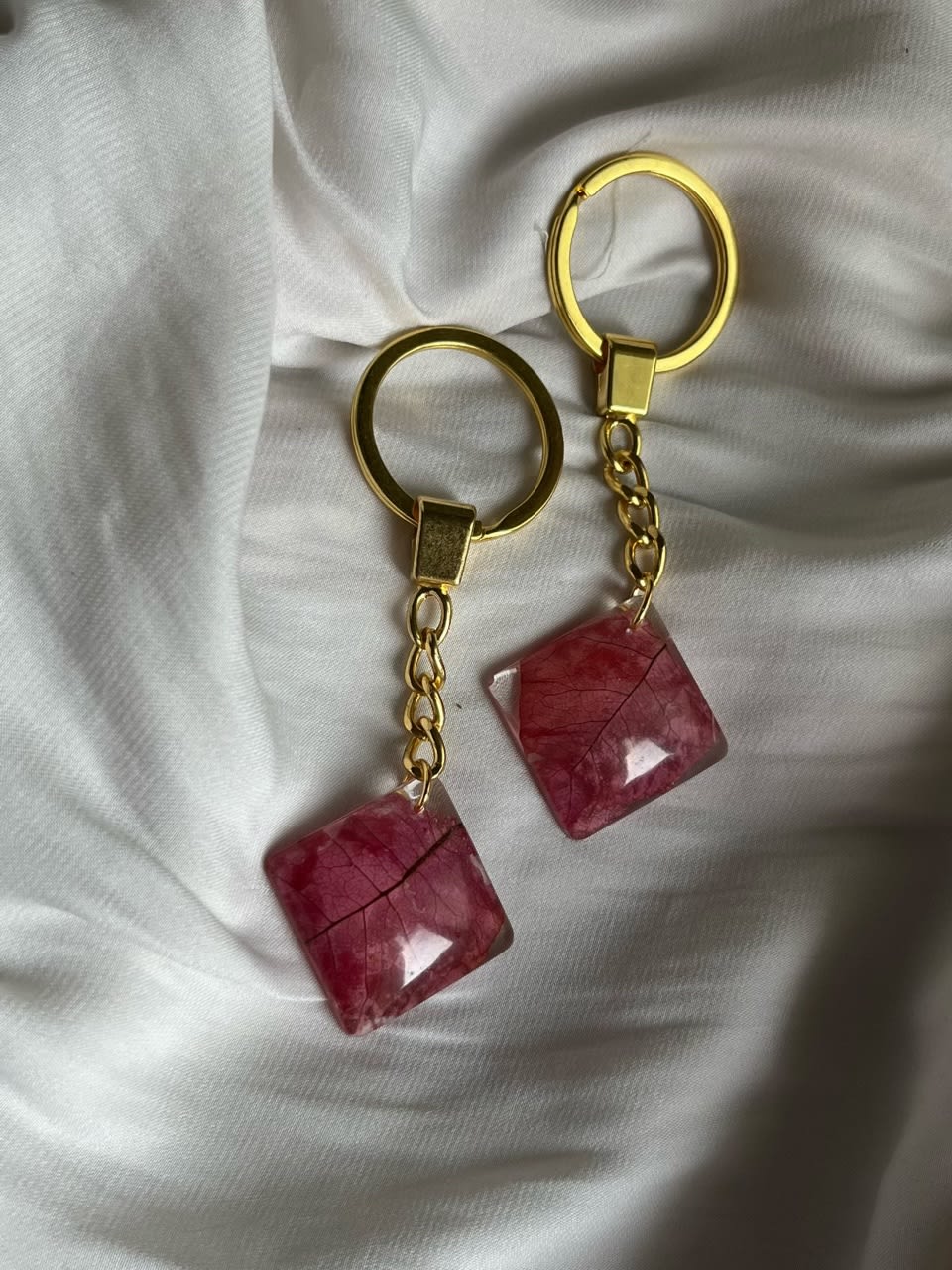 Couple keychains Real flowers preserved in resin.