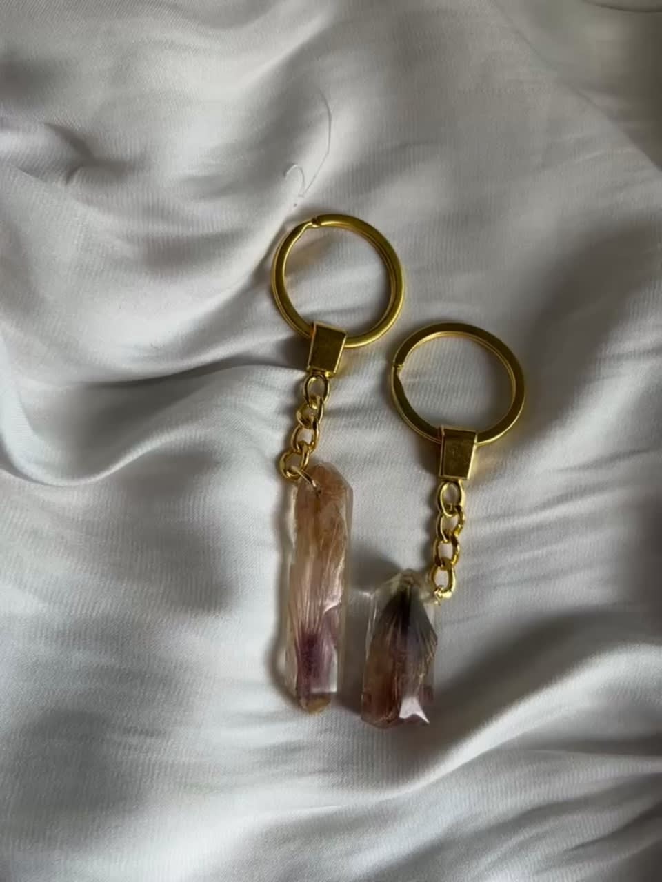 Couple keychains Real flowers preserved in resin.