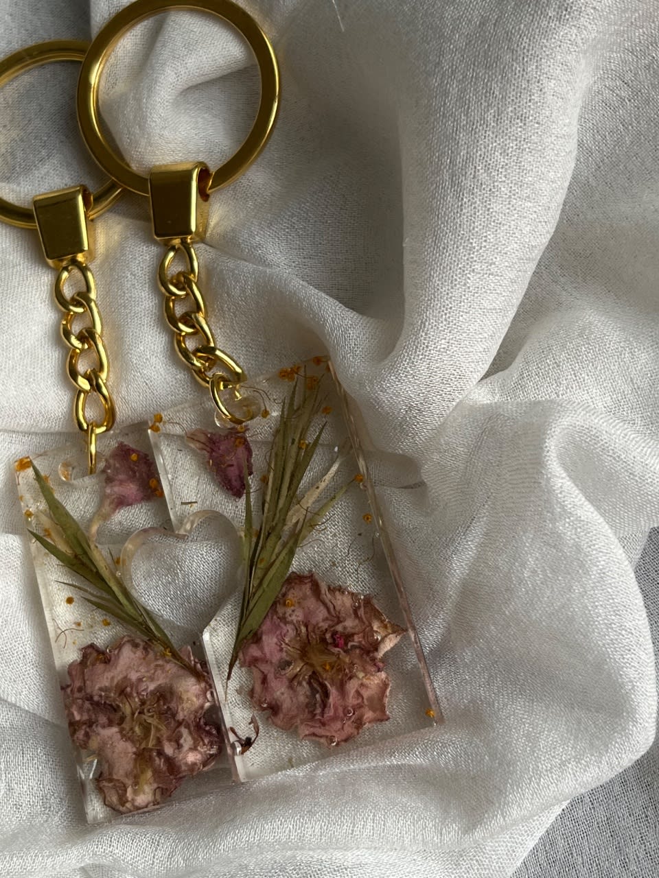 Couple keychains  Real flowers preserved in resin.