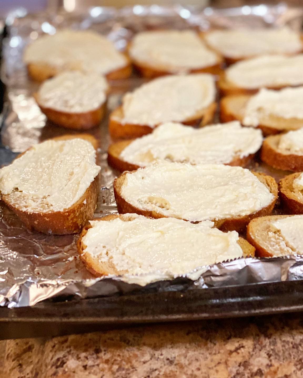 Serving Whipped Feta Crostini with Toasted Pine Nuts and Honey
