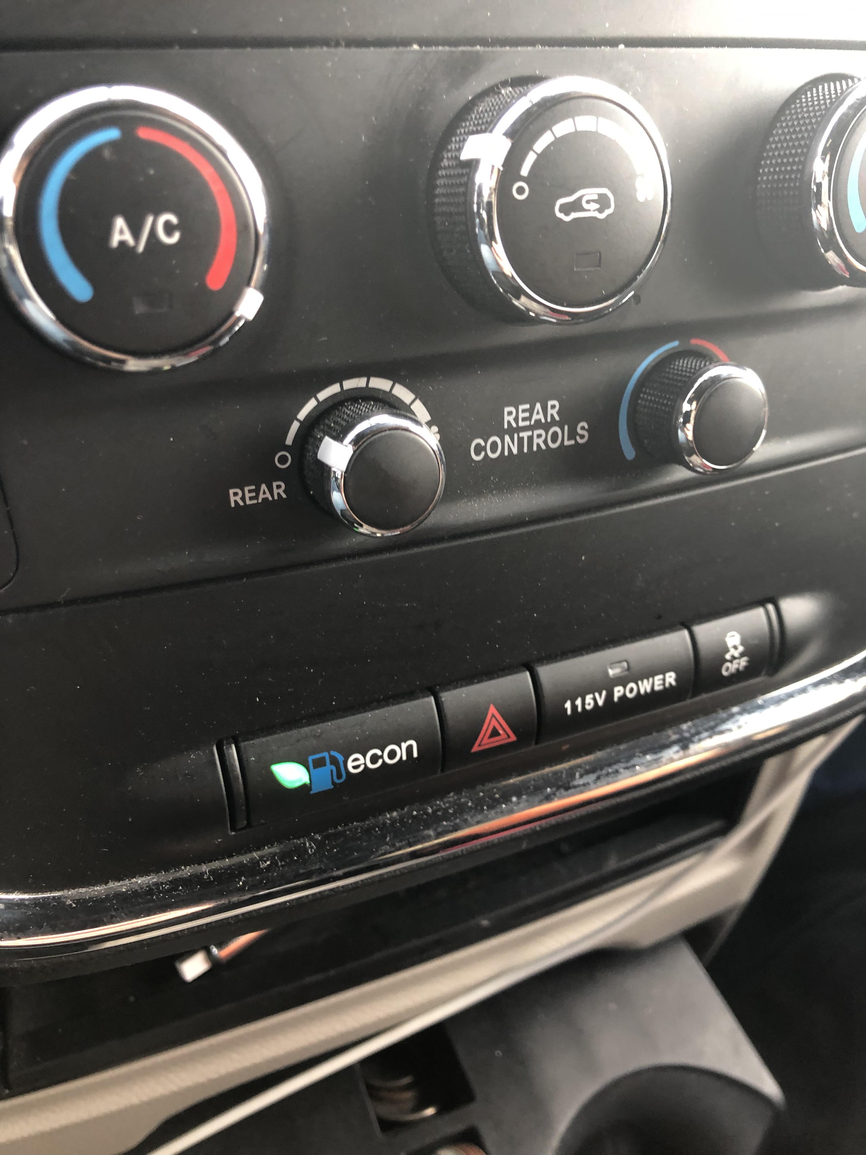 dodge caravan econ button