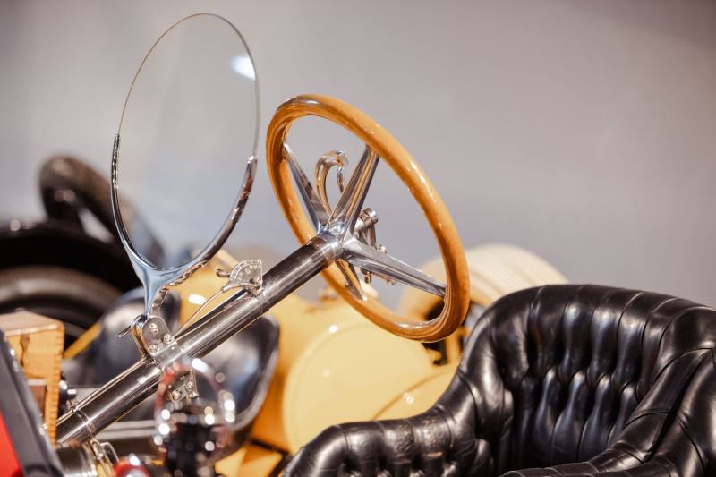 Mercer cockpit — wood wheel & black leather