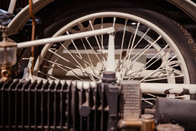 Brass-era spokes, painted white