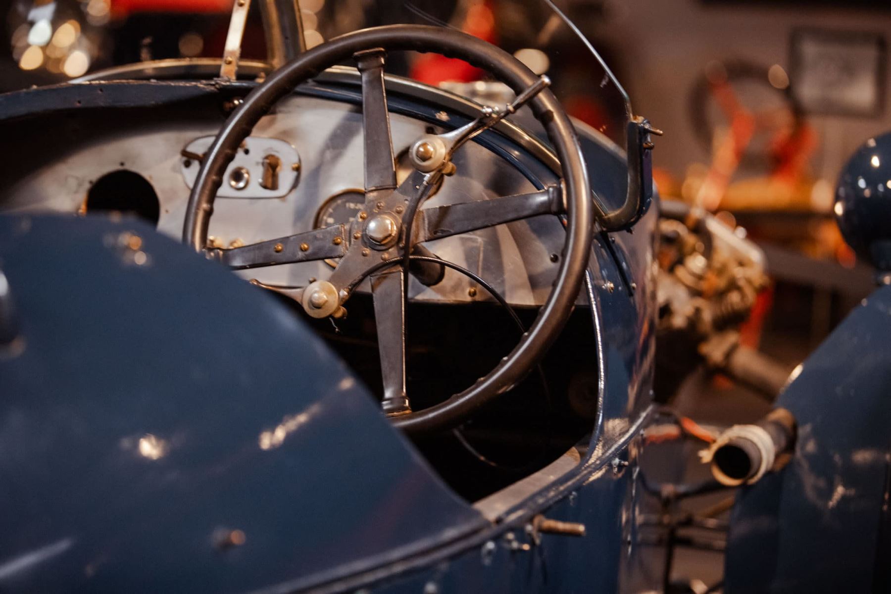 Bugatti steering wheel, blue cockpit