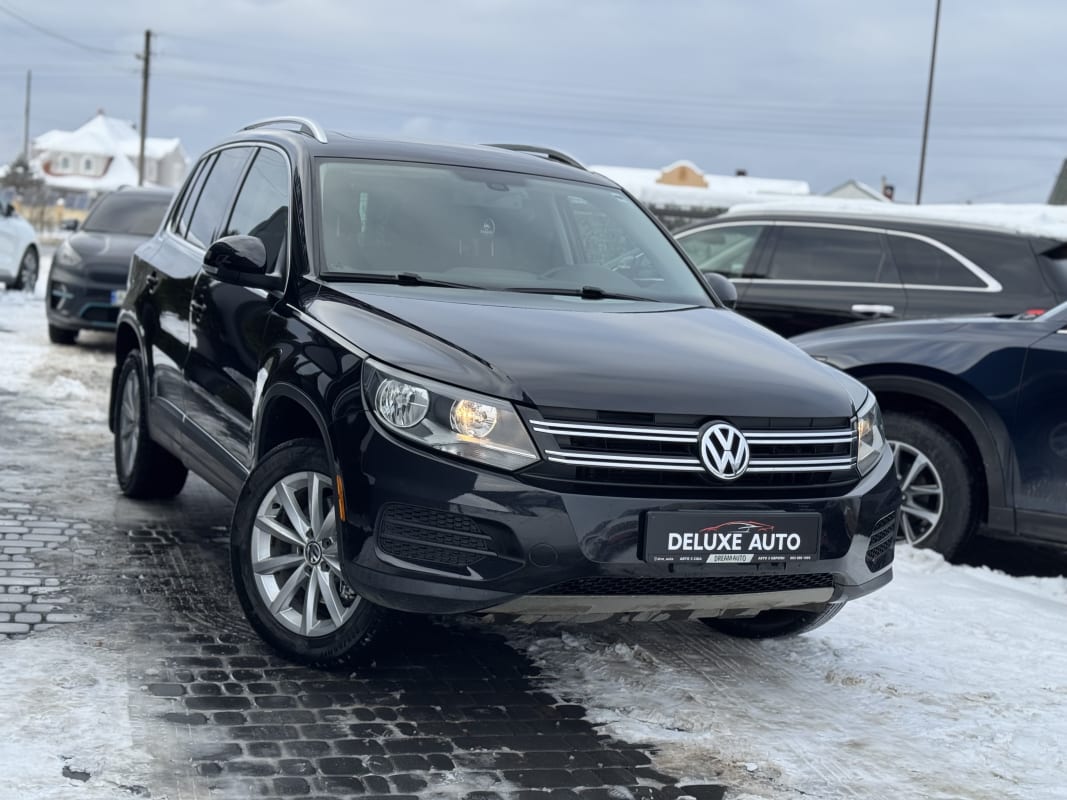 Volkswagen Tiguan - фото 1
