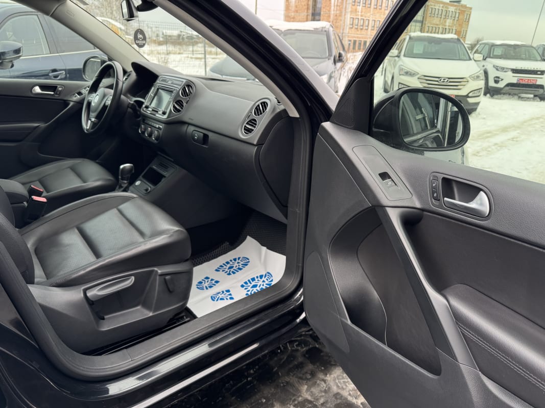 Volkswagen Tiguan - фото 8