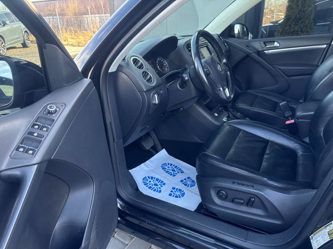Volkswagen Tiguan - фото 8