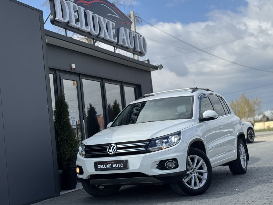 Volkswagen Tiguan - фото 1
