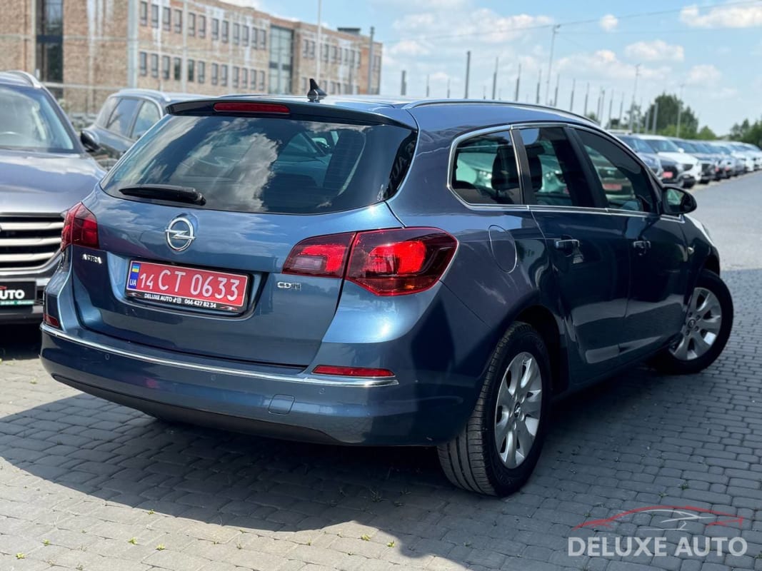 Opel Astra J - фото 4