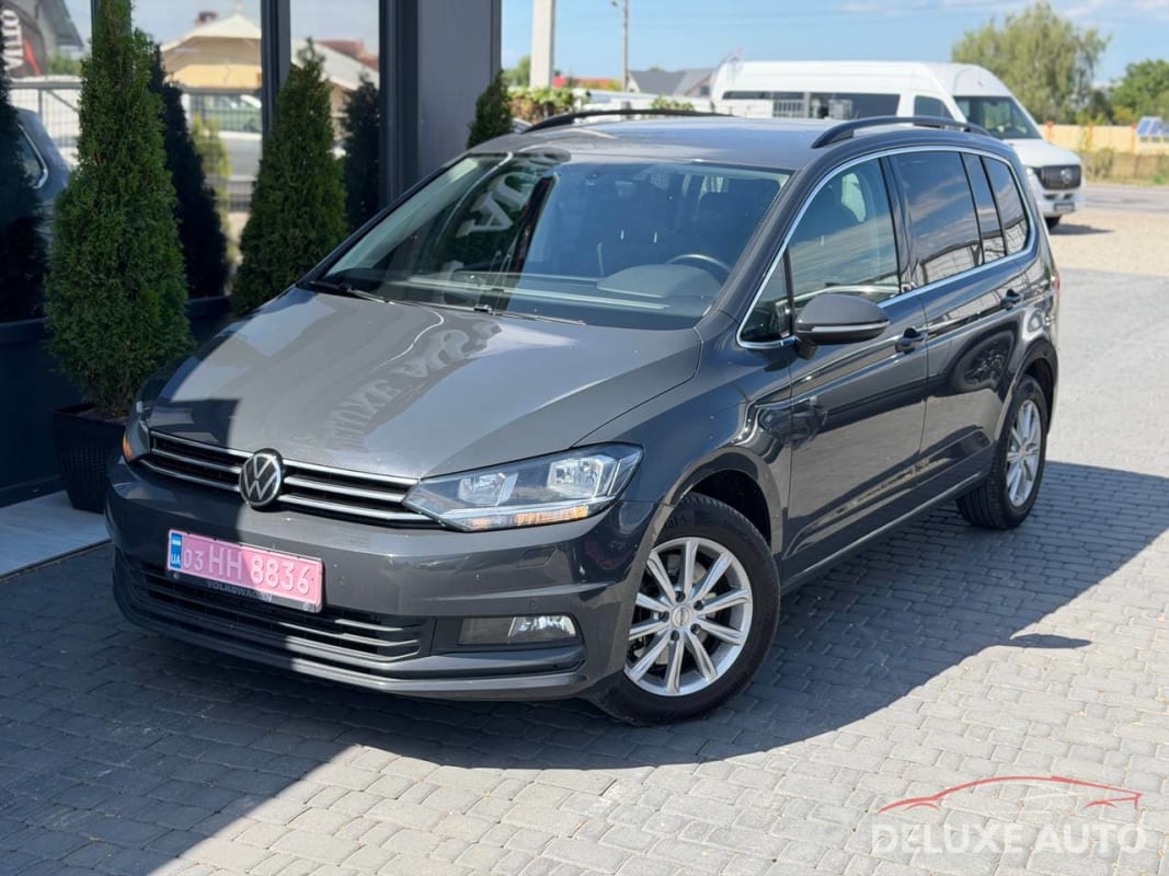 Volkswagen Touran - фото 1