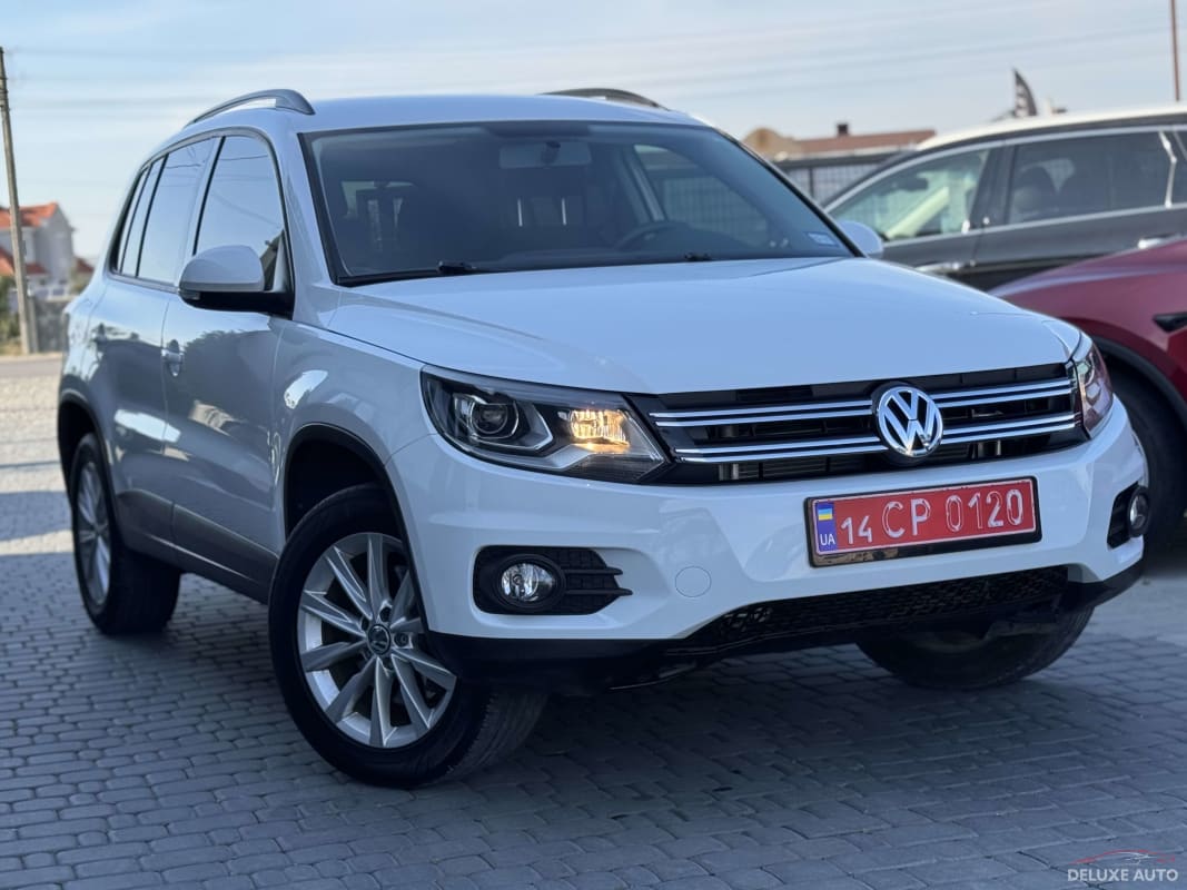 Volkswagen Tiguan - фото 1
