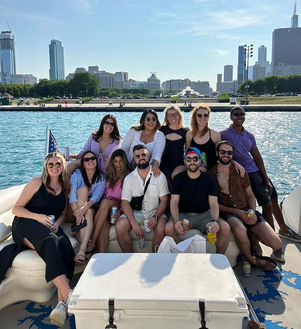 group of friends on a boat rental showing the Chicago skyline