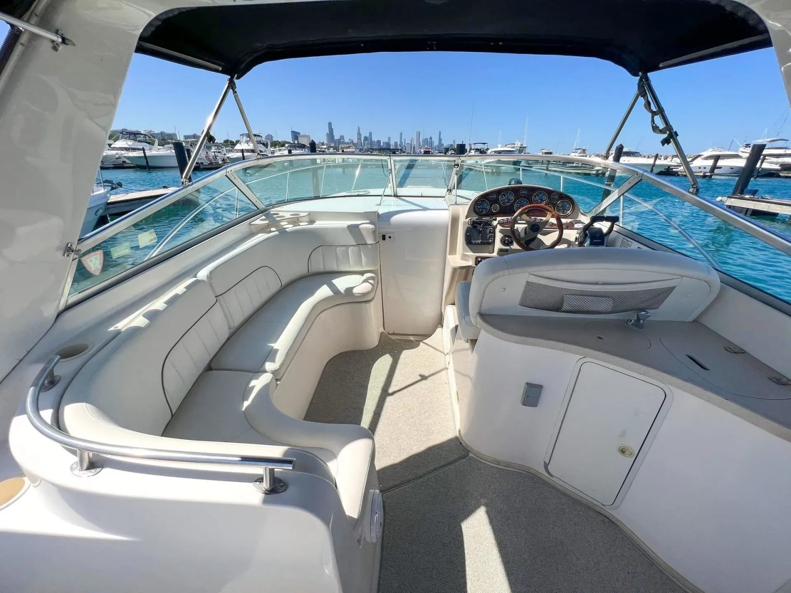 View from inside the boat cockpit with Chicago skyline in the background
