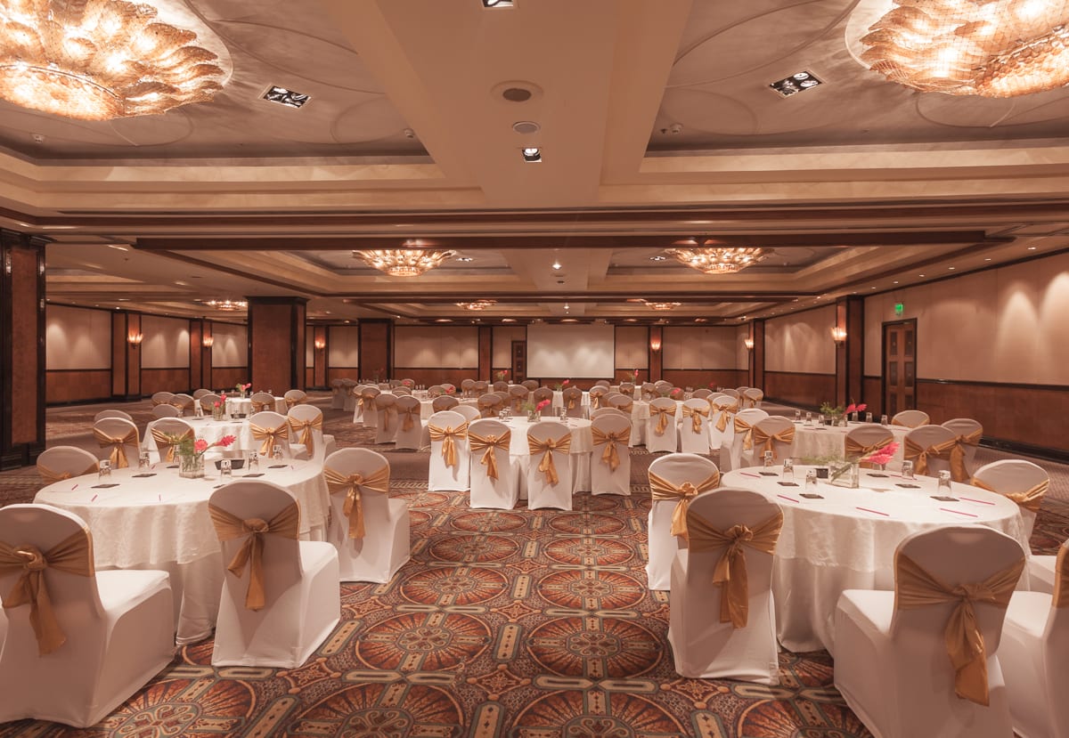 Vivanta Bengaluru Residency Road wedding Trinity Hall round table reception setup — Panigrahana
