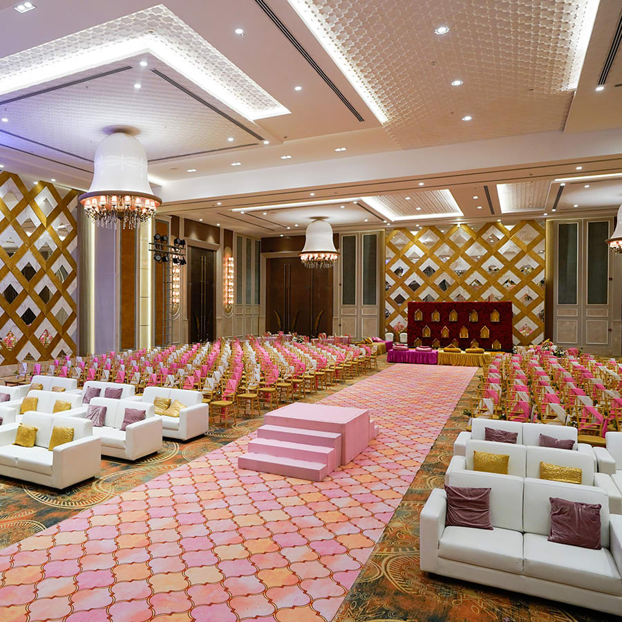 The Corinthians Resort Bangalore grand wedding ceremony on resort lawn with floral decor — Panigrahana