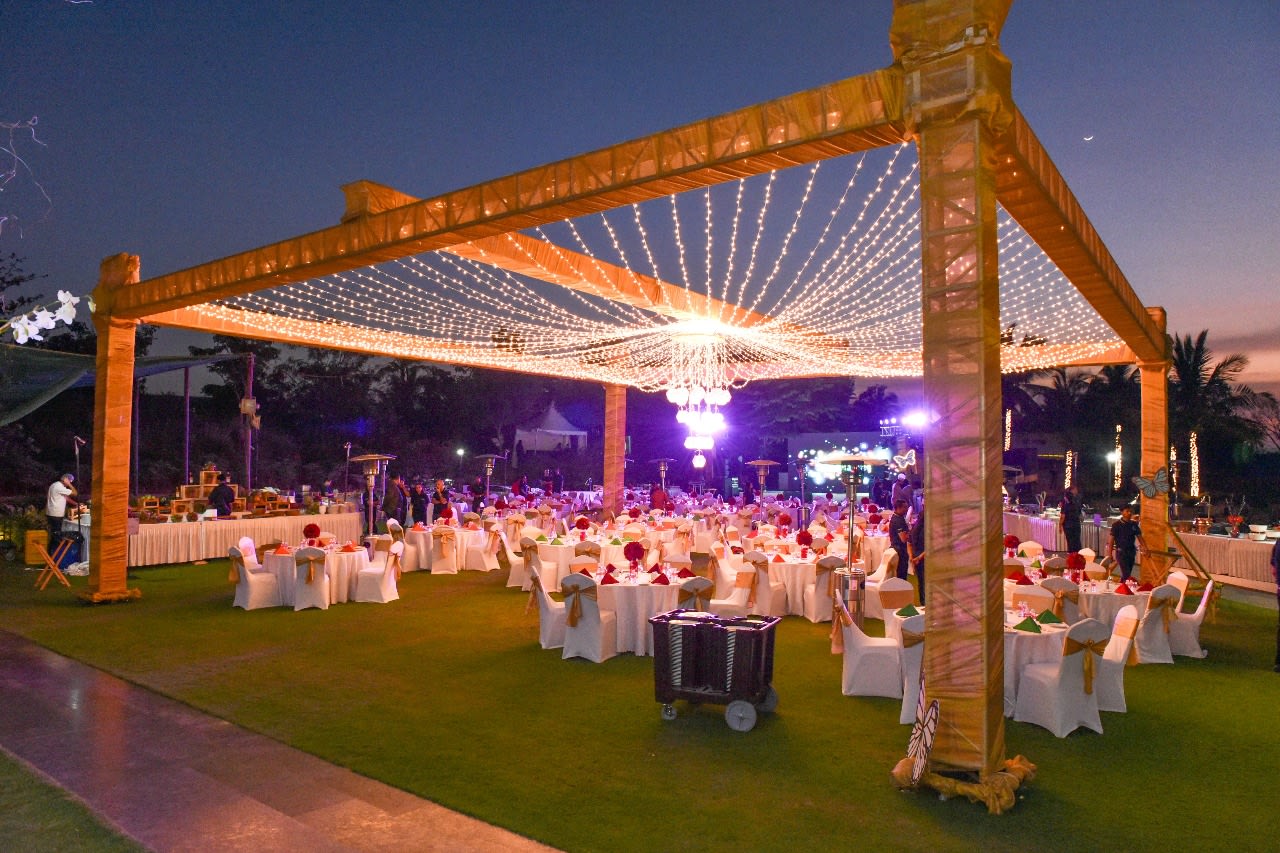 Prestige Golfshire Bangalore outdoor wedding ceremony on scenic grounds — Panigrahana