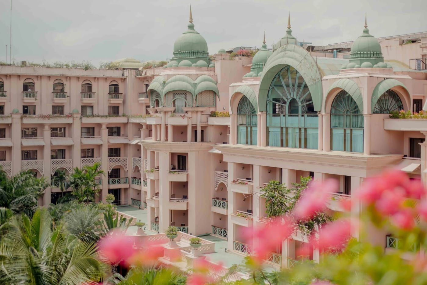 The Ritz-Carlton Bangalore grand ballroom decorated for Christian wedding ceremony with floral aisle — Panigrahana