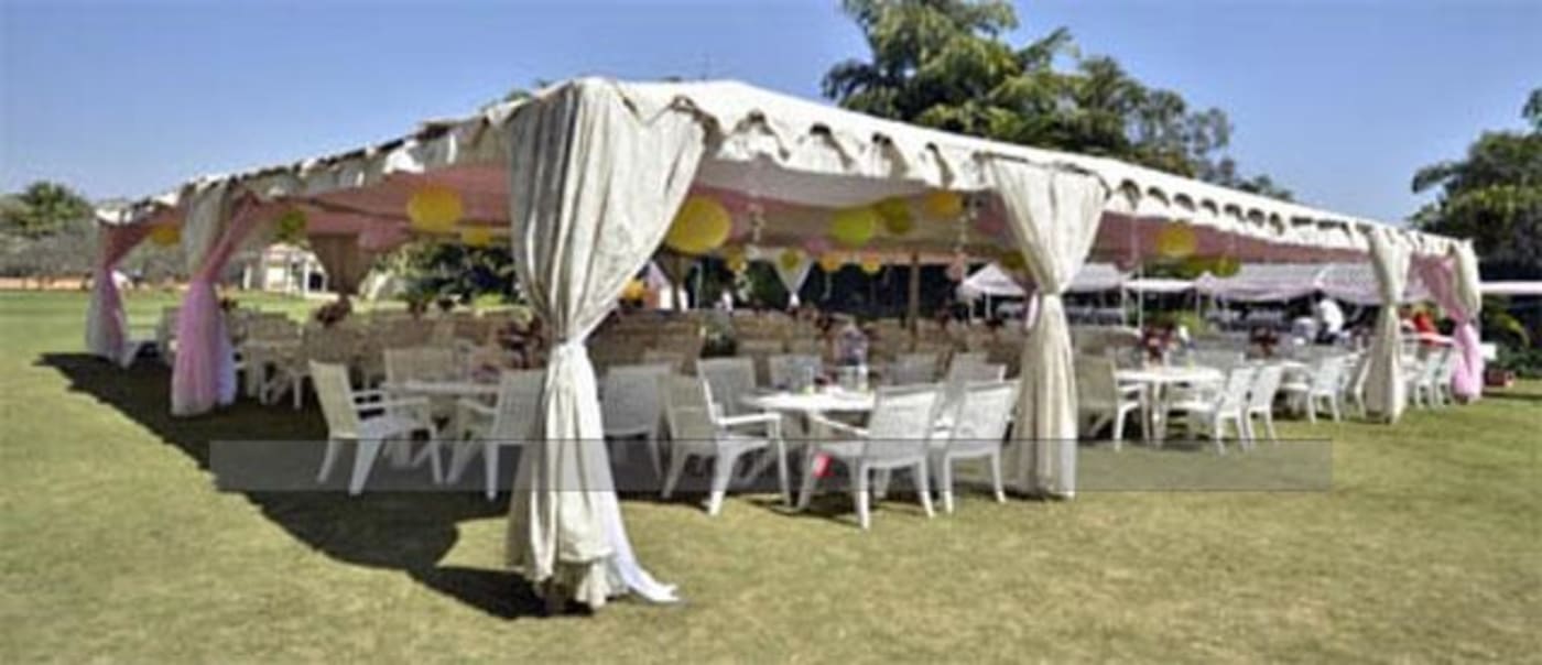 The Windflower Prakruthi Bangalore outdoor wedding ceremony on scenic grounds — Panigrahana