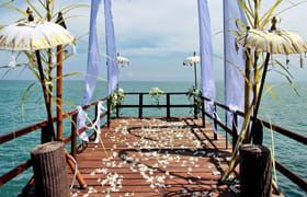 Kisik jetty wedding ceremony at AYANA Resort Bali over the ocean waters — Panigrahana