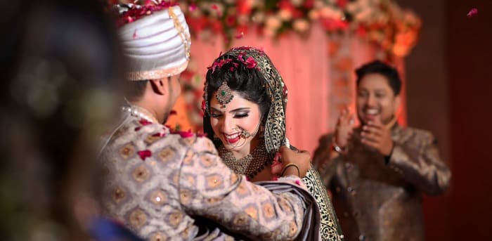 Shangri-La Bengaluru wedding package venue with elegant drapery and chandelier lighting — Panigrahana