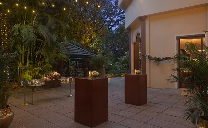 The Oberoi Bengaluru Lapis Terrace open-air wedding venue overlooking gardens MG Road — Panigrahana