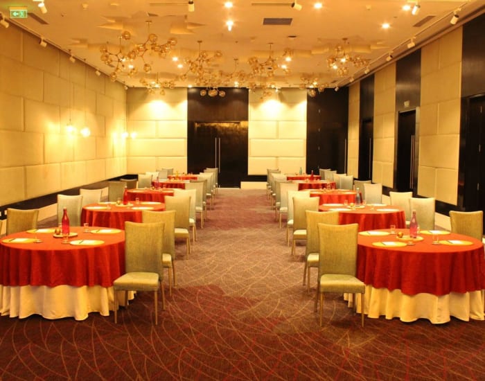Renaissance Bengaluru Race Course Hotel meeting room set in banquet style for intimate wedding — Panigrahana