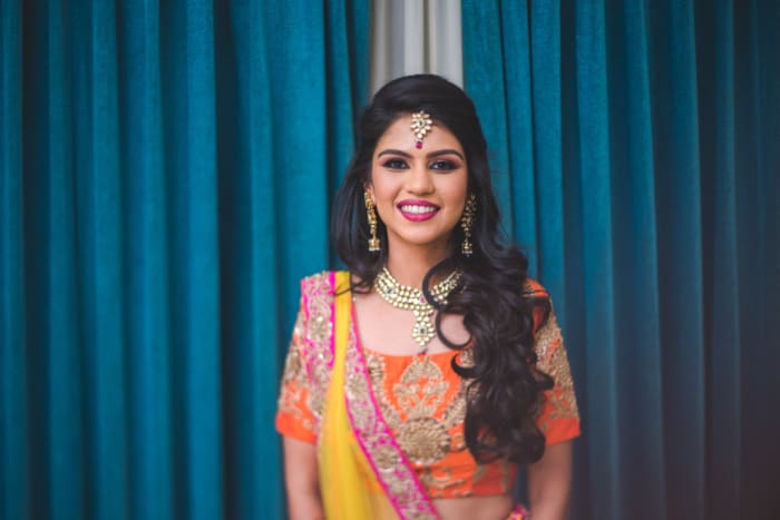 Golden Palms Resort Bangalore poolside wedding event with tropical landscaping — Panigrahana
