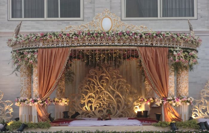 Eagleton Golf Resort Bidadi Bangalore Indian wedding mandap decor with traditional floral arrangement — Panigrahana