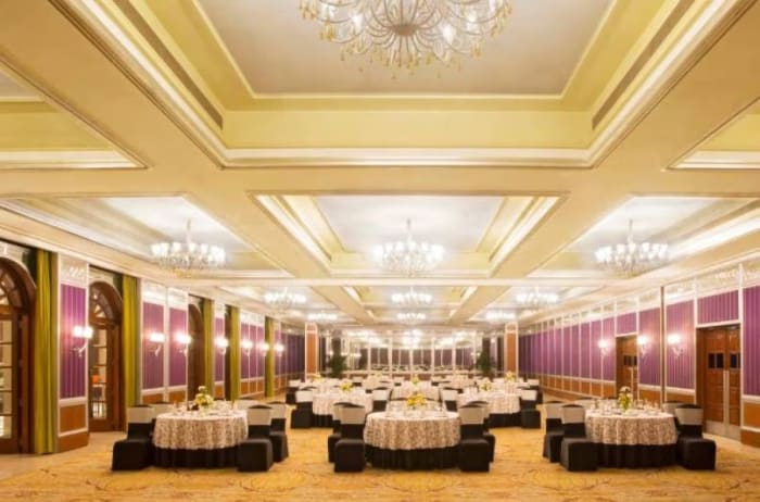 ITC Gardenia Bengaluru outdoor mandap with marigold and jasmine flowers for wedding ceremony — Panigrahana