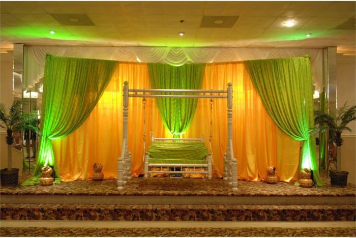 Outdoor wedding ceremony venue at The Leela Goa with lush tropical gardens — Panigrahana