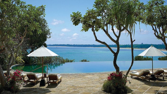 Four Seasons Resort Bali Jimbaran Bay infinity pool terrace for intimate wedding reception — Panigrahana