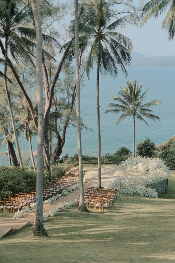 Amanpuri Phuket Thailand outdoor wedding ceremony by the Andaman Sea at sunset — Panigrahana
