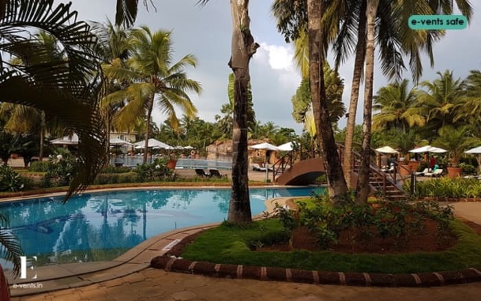 The Zuri White Sands Goa Resort pool and garden area for destination wedding reception — Panigrahana