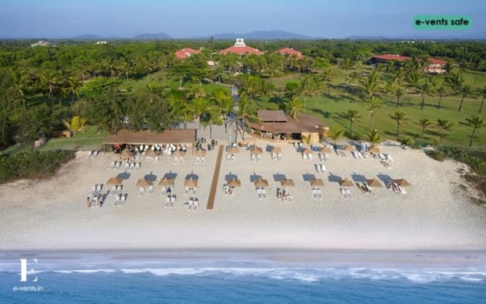 Caravela Beach Goa resort pool terrace and garden for beach wedding celebration — Panigrahana