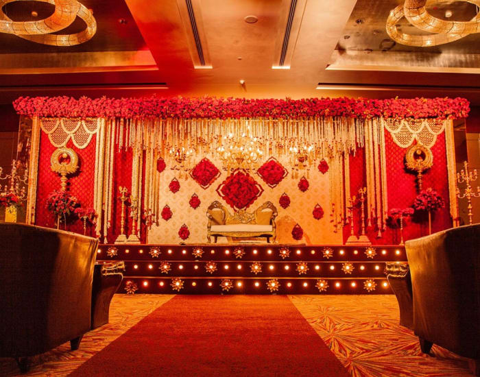 Sheraton Grand Bangalore Hotel at Brigade Gateway Indian wedding celebration with guests at reception — Panigrahana