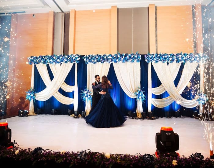 Bengaluru Marriott Hotel Whitefield outdoor lawn decorated for Indian wedding with draped canopy — Panigrahana