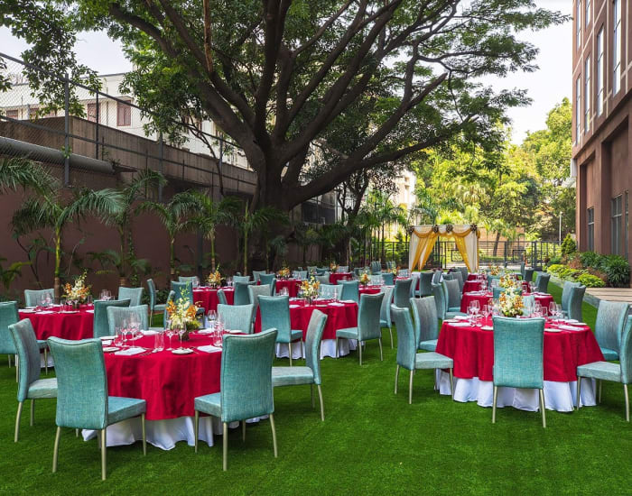 Renaissance Bengaluru Race Course Hotel grand banquet hall set for Indian wedding reception — Panigrahana