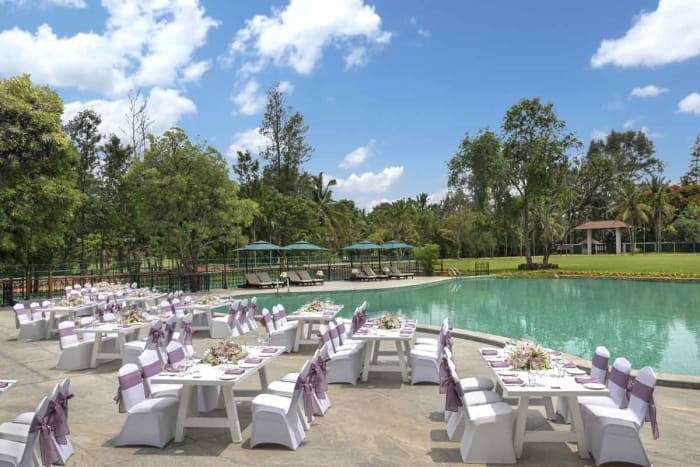 Big Banyan Vineyard Bangalore resort cottage and vineyard backdrop for destination wedding — Panigrahana