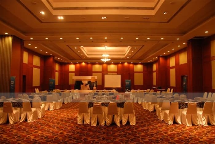 Chancery Pavilion Bangalore poolside wedding ceremony setup with floral decor — Panigrahana